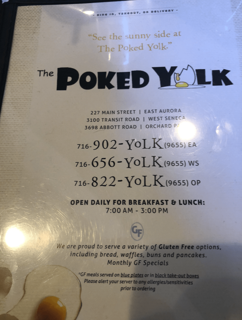 image description: the front page of the menu for the Poked Yolk shows the locations, telephone numbers, and hours for the Poked Yolk chain.