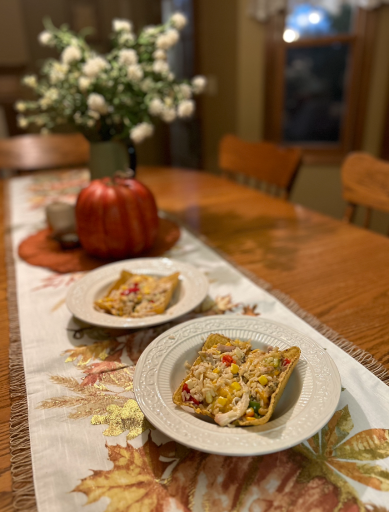 alt text: our two plates of taco boats on our dining room table ready to eat!