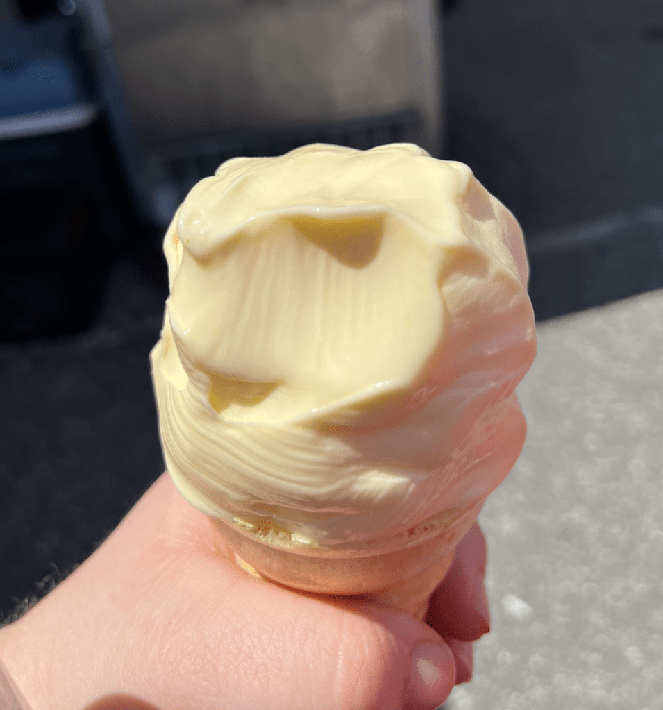 dole whip pineapple ice cream in a cone
